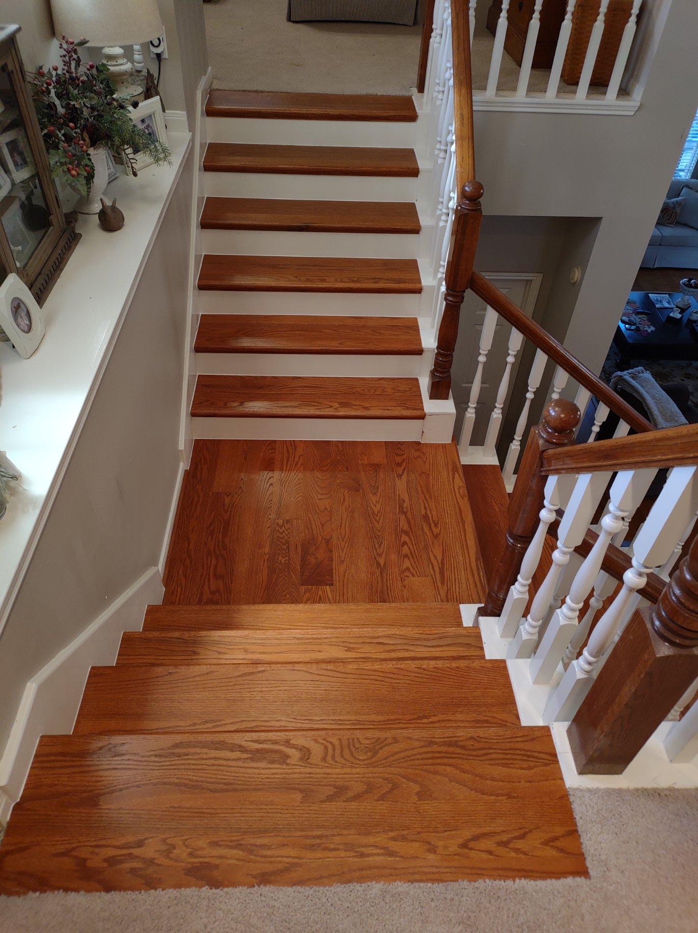 hardwood + white risers staircase installation, wfa's custom hardwood floors, houston texas